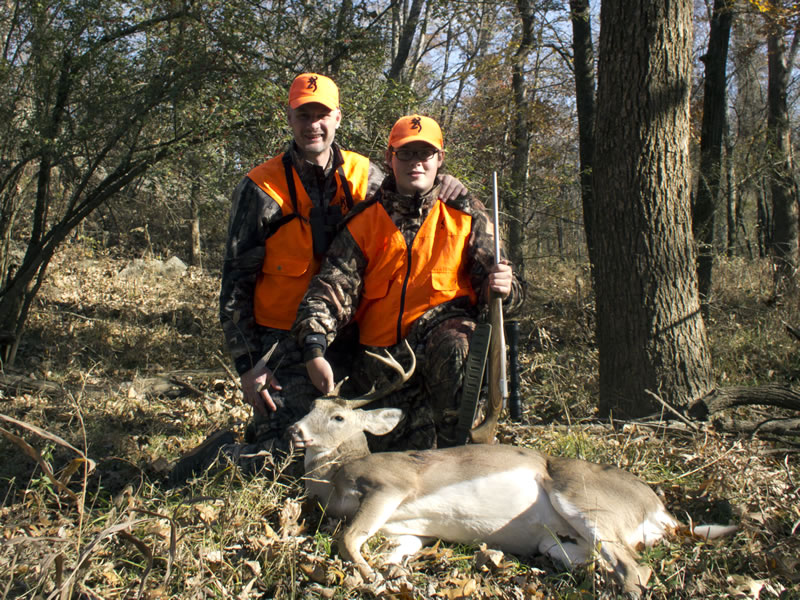 Dallen with his first Whitetail buck taken with a 243 WSSM