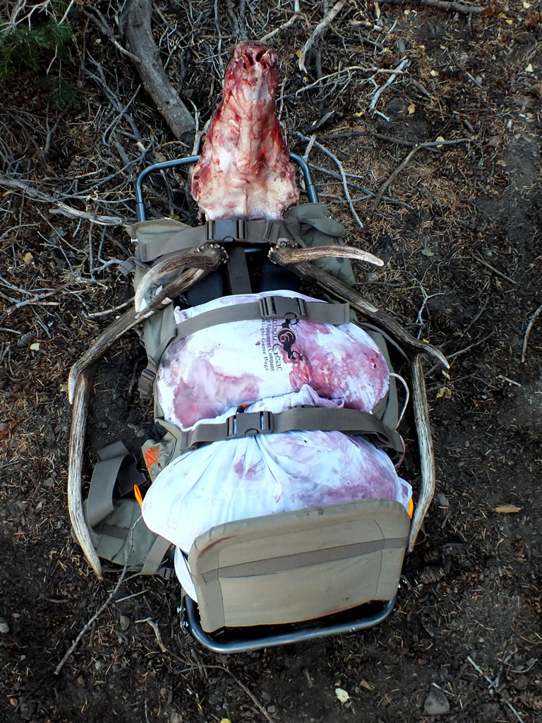 Alps Outdoorz Commander frame pack and Caribou Gear's Camp Meat game bags with bull elk