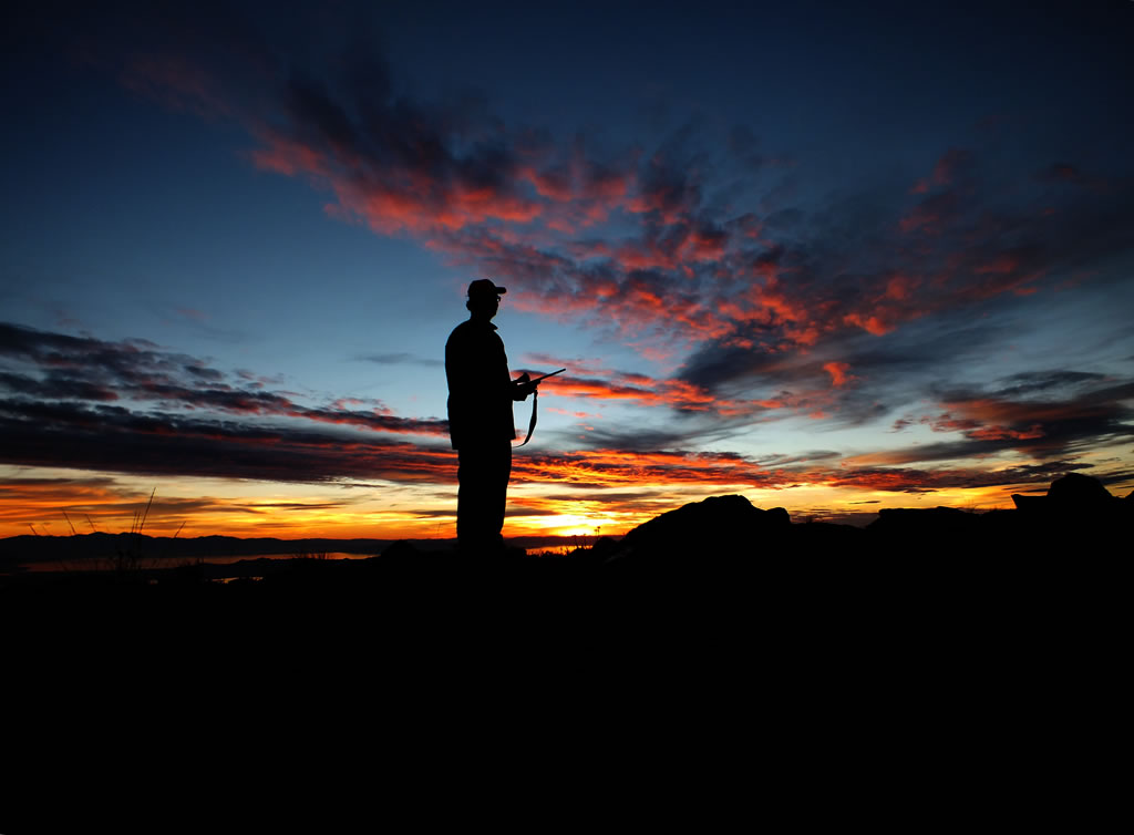 Dallen posing for a photo a sunset.