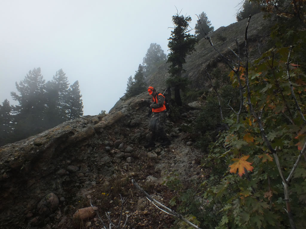 Hiking in cliffs while elk hunting.