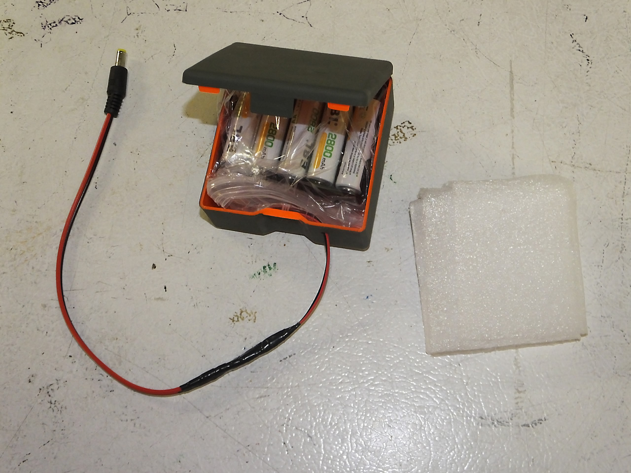 Berger bullet case painted for 12v aa battery pack