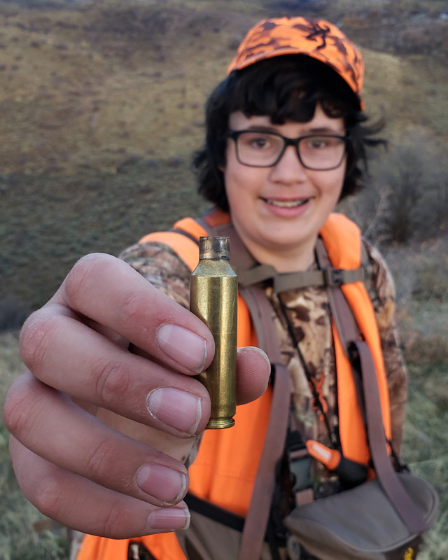 Kaden with the 300 WSM case that killed his buck.