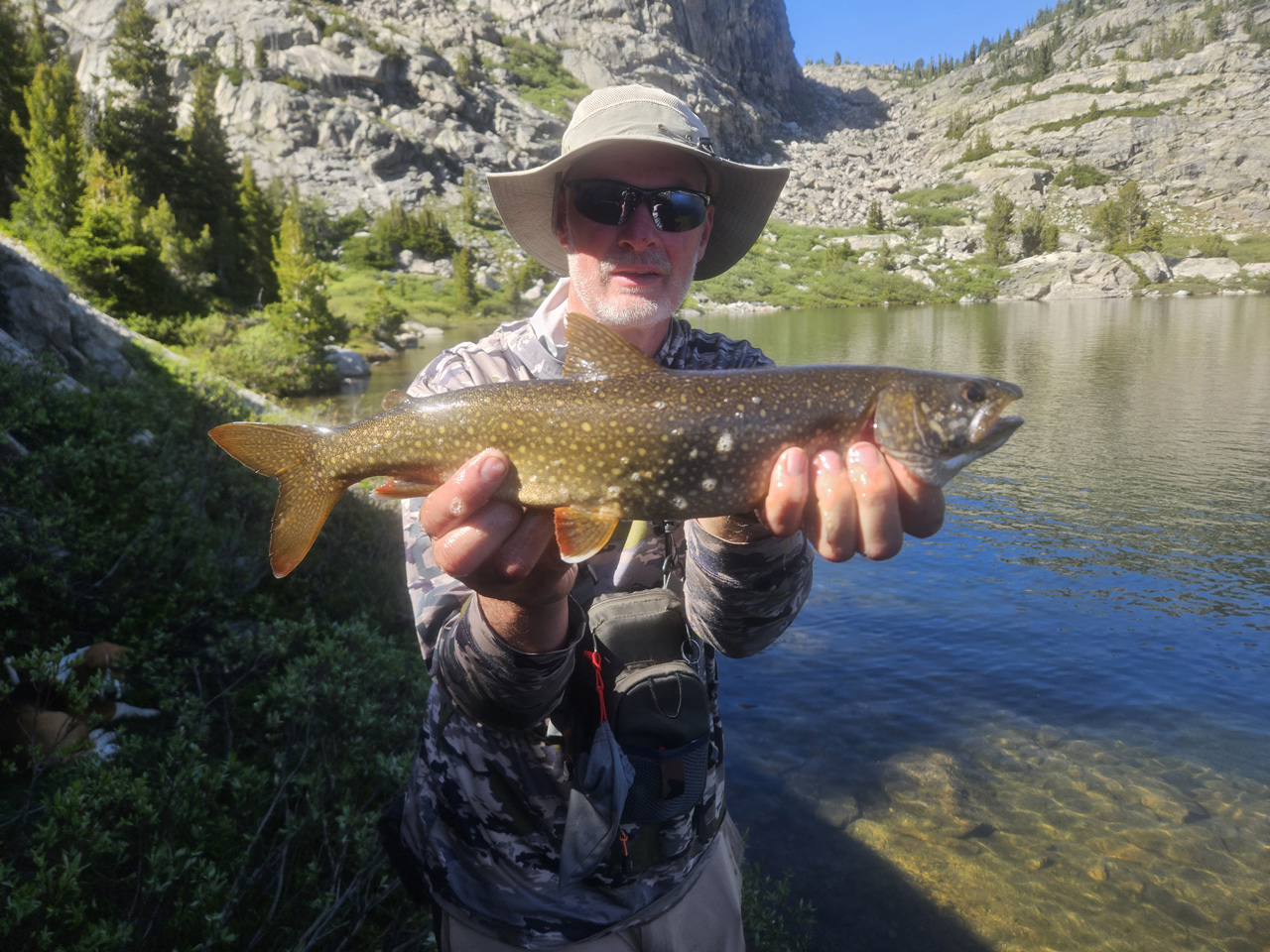 Dad with his lake trout.